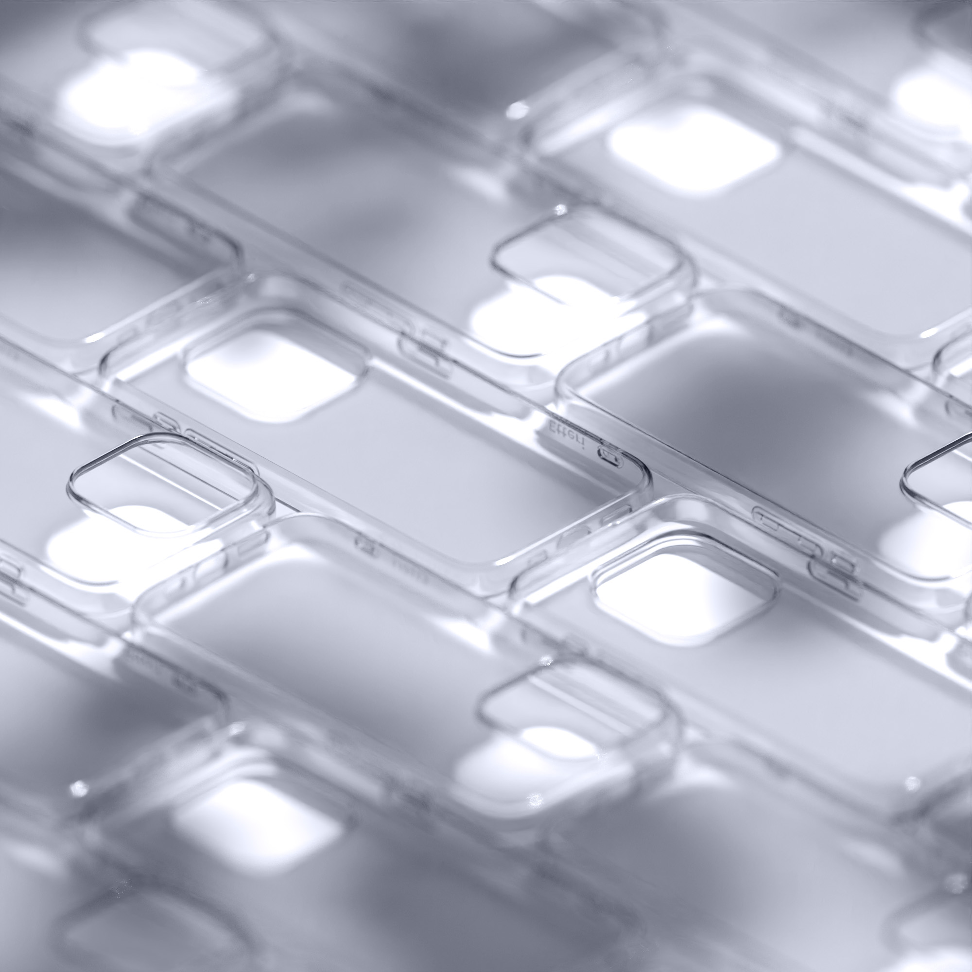 Zbliżenie wielu przezroczystych etui na telefony. Etui ułożone są we wzór siatki.