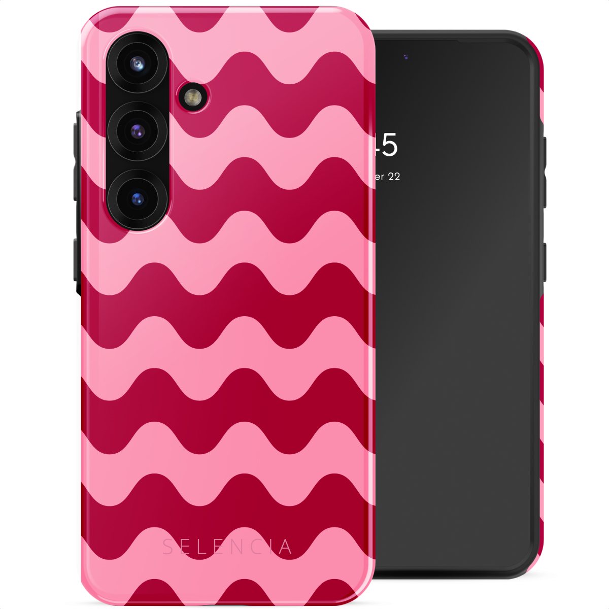Roze telefoonhoesje met golfpatroon naast een zwarte telefoon.