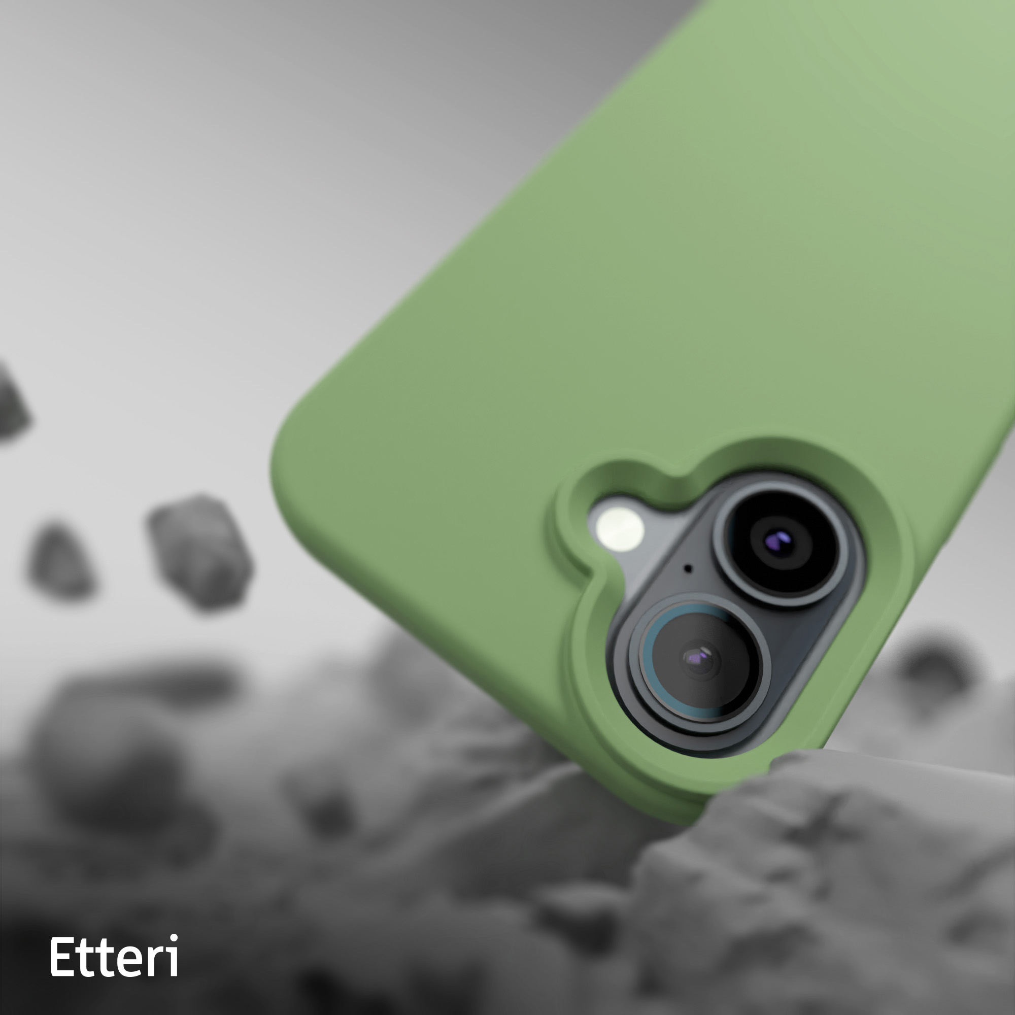 Primo piano di una custodia verde per telefono con due obiettivi della fotocamera. Custodia angolata, con rocce.