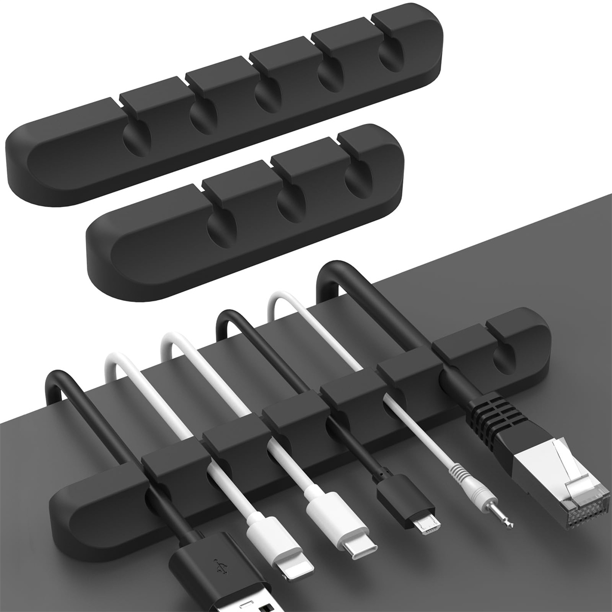 Schwarze Kabelorganisatoren halten verschiedene Kabel: USB, Lightning und Ethernet.