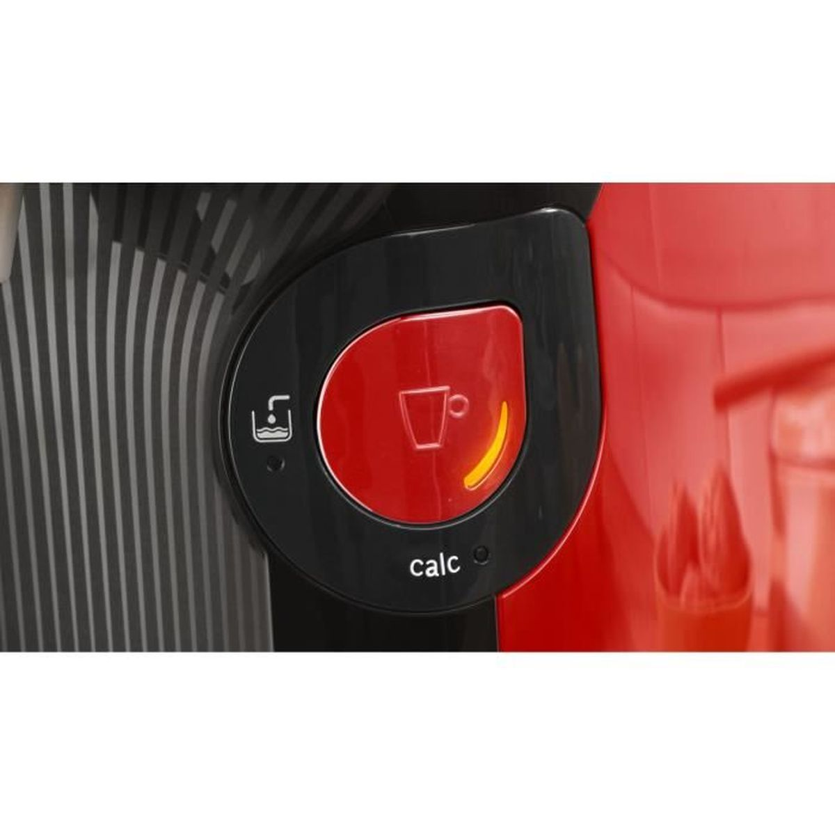 Zbliżenie czerwonego i czarnego panelu urządzenia z przyciskiem i słowem 'calc'.