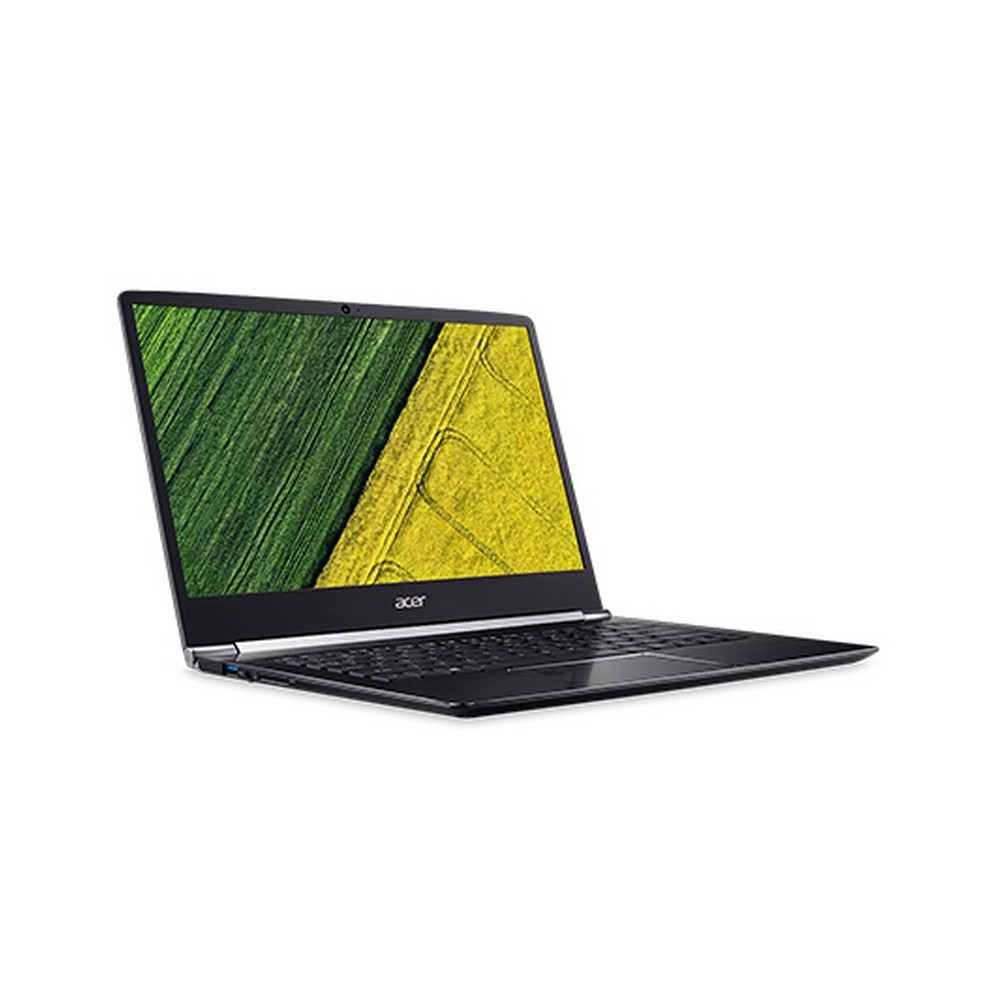 Laptop nero, aperto, vista angolata. Lo schermo mostra un paesaggio verde e giallo.