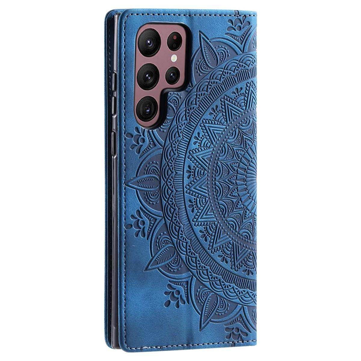 Blaue Handyhülle mit Mandala-Design, offen.