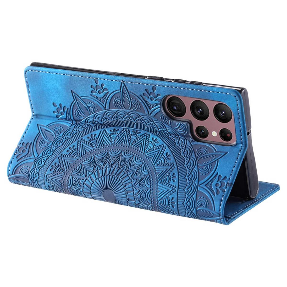 Blaue Leder-Handyhülle mit Mandala-Design, zeigt ein Telefon im Inneren der Hülle.