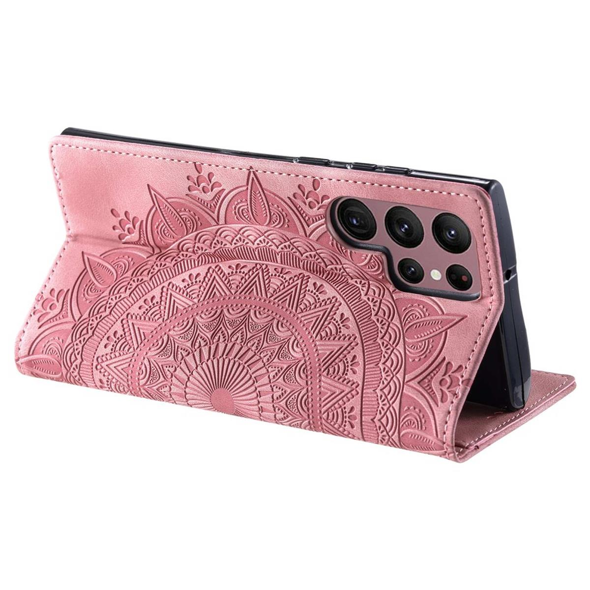 Rosa Handyhülle mit Mandala-Design, offen, Telefon sichtbar. Weißer Hintergrund.