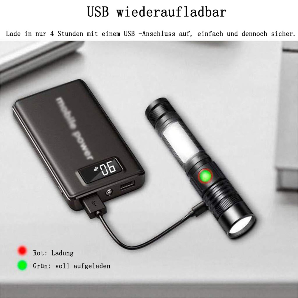 Schwarzes Ladegerät mit Powerbank und Taschenlampe. Die Taschenlampe hat ein grünes Licht, das Vollladung anzeigt.