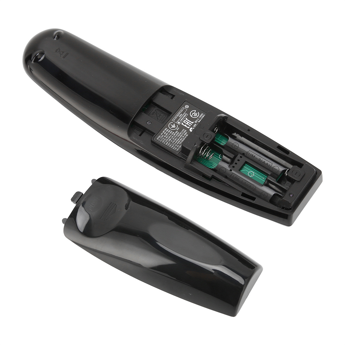 Schwarze Fernbedienung, die hintere Abdeckung ist geöffnet und zeigt Batterien und Innenteile.
