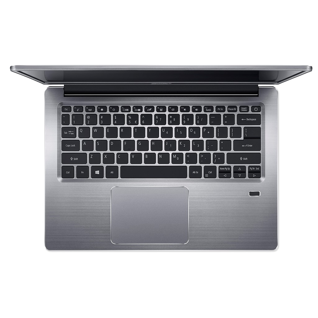 Laptop, vista dall'alto, aperto con la tastiera visibile. Il laptop è argentato.