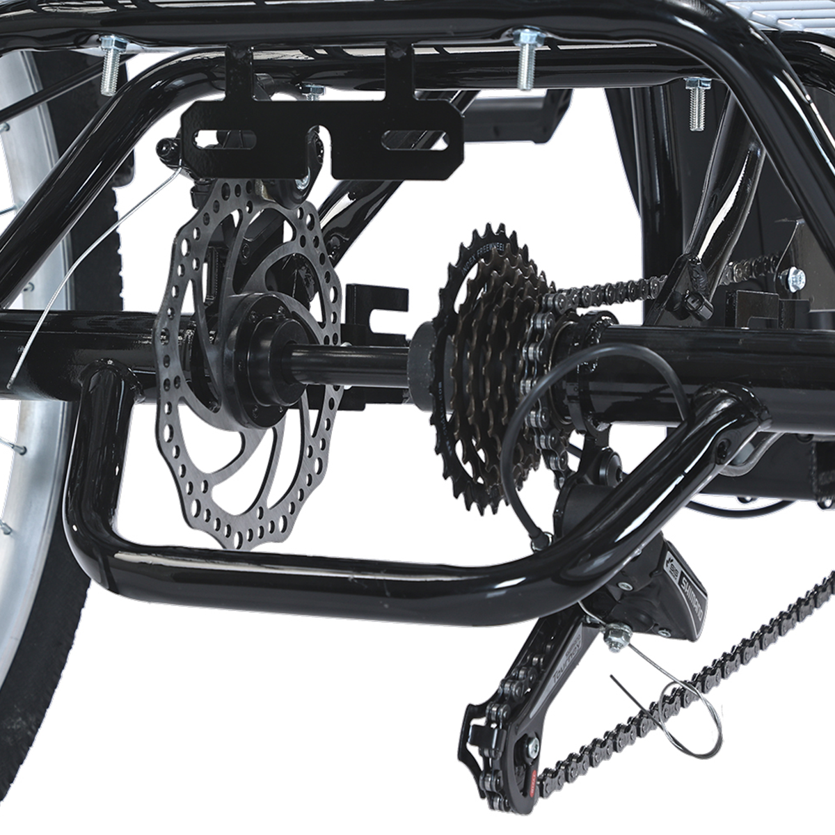 Tylne koło i układ biegów trójkołowca, z czarną ramą.