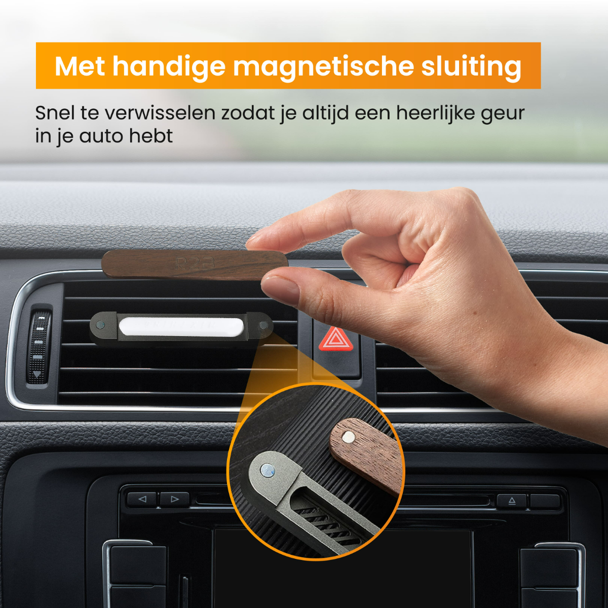 Hand holding a wooden car air freshener. Detail of vent and car interior.