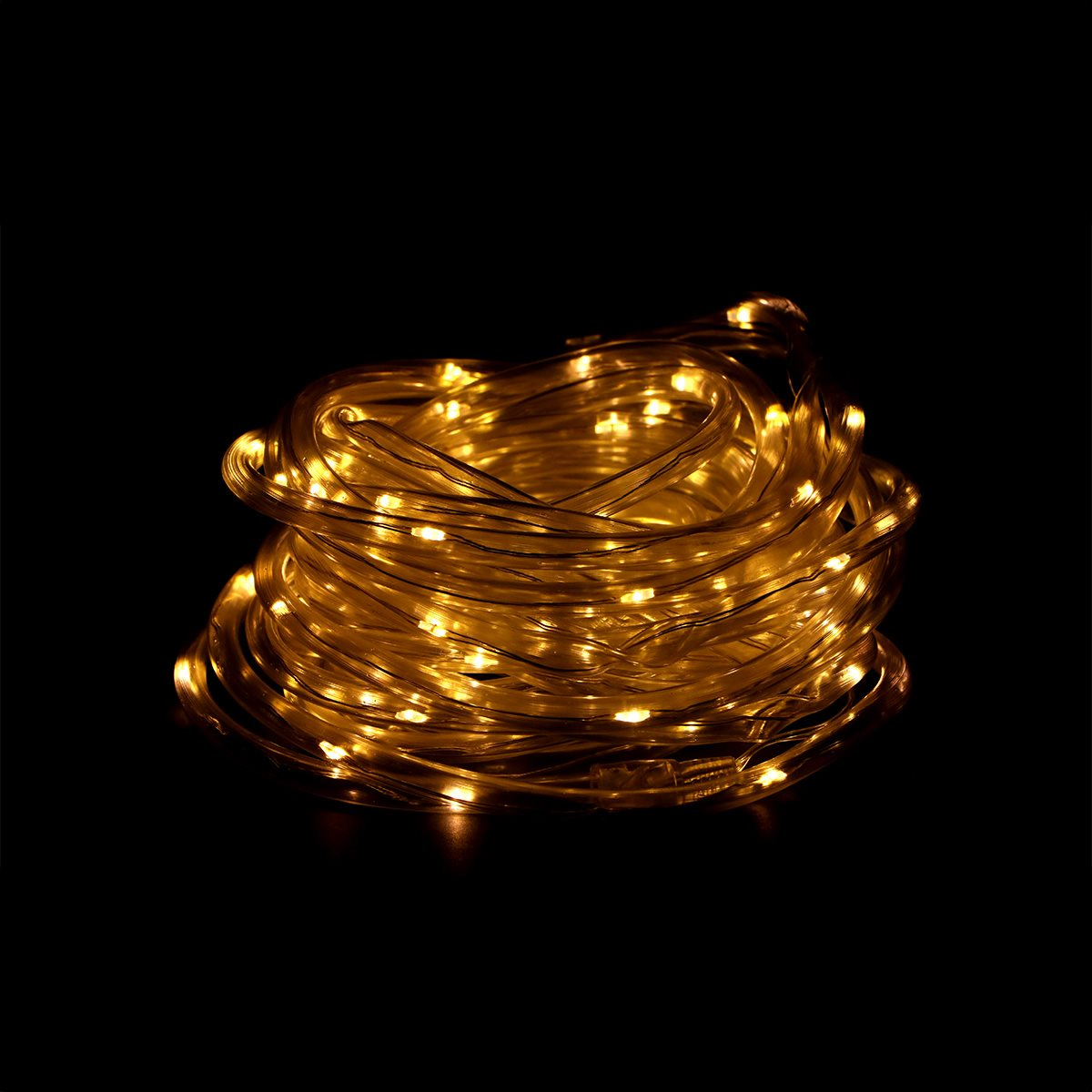 A bundle of warm, glowing fairy lights against a black background.