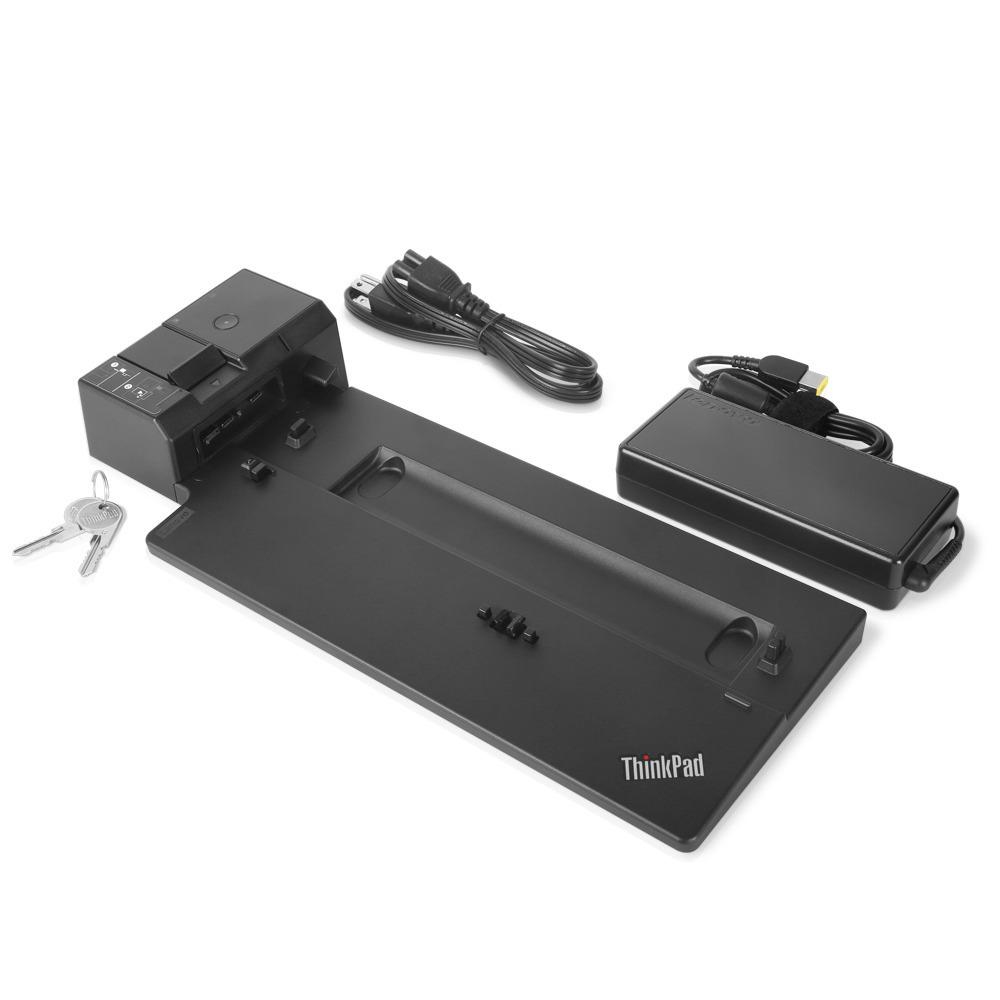 Stazione di docking ThinkPad nera con alimentatore, cavo e chiavi su sfondo bianco. La stazione è in mostra.