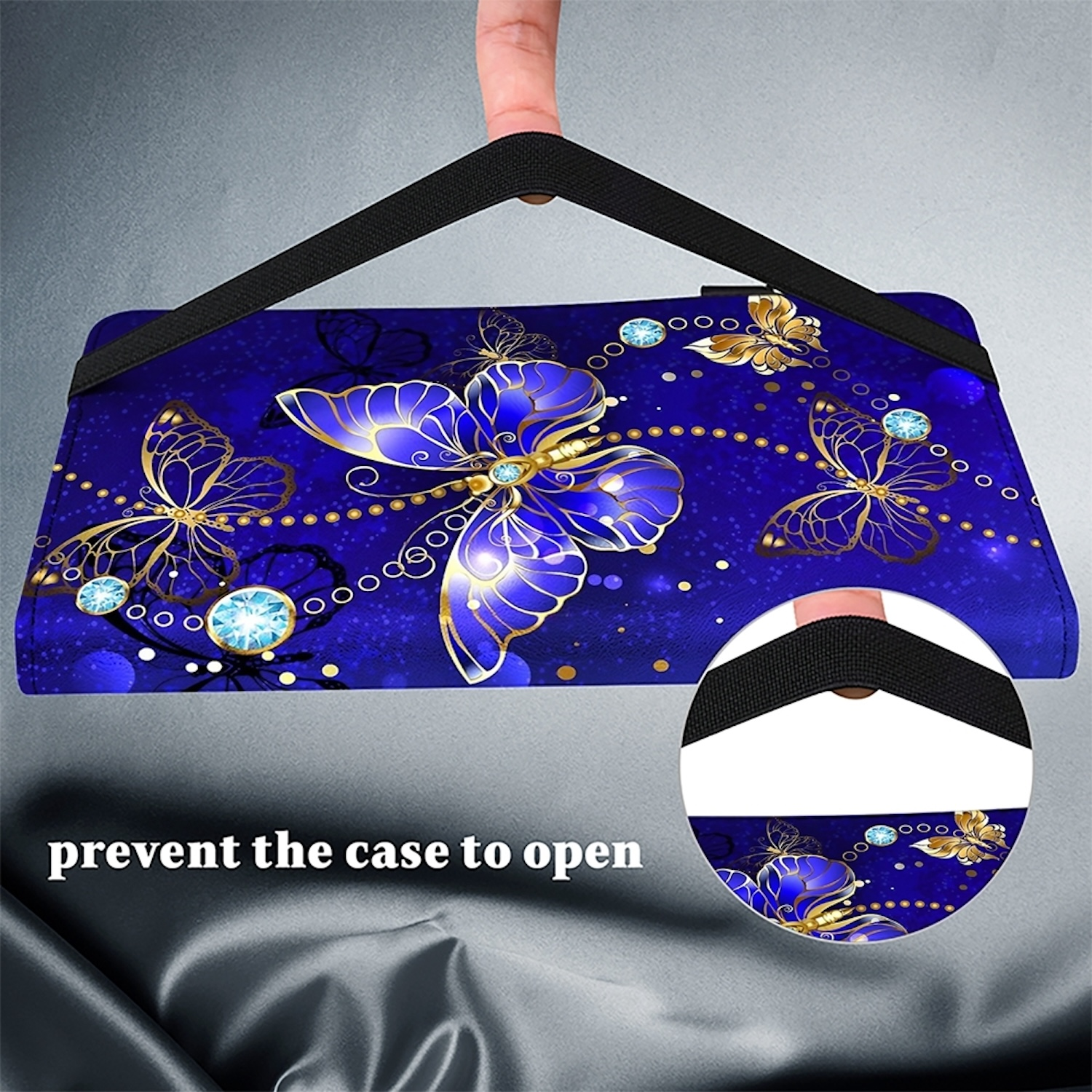 Blaues Case mit Schmetterlingsmuster und schwarzem Griff, gehalten von einer Hand.