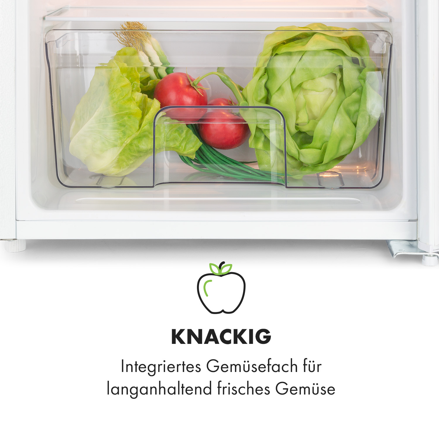 Un cajón de refrigerador abierto lleno de verduras. Un logotipo de manzana es visible.