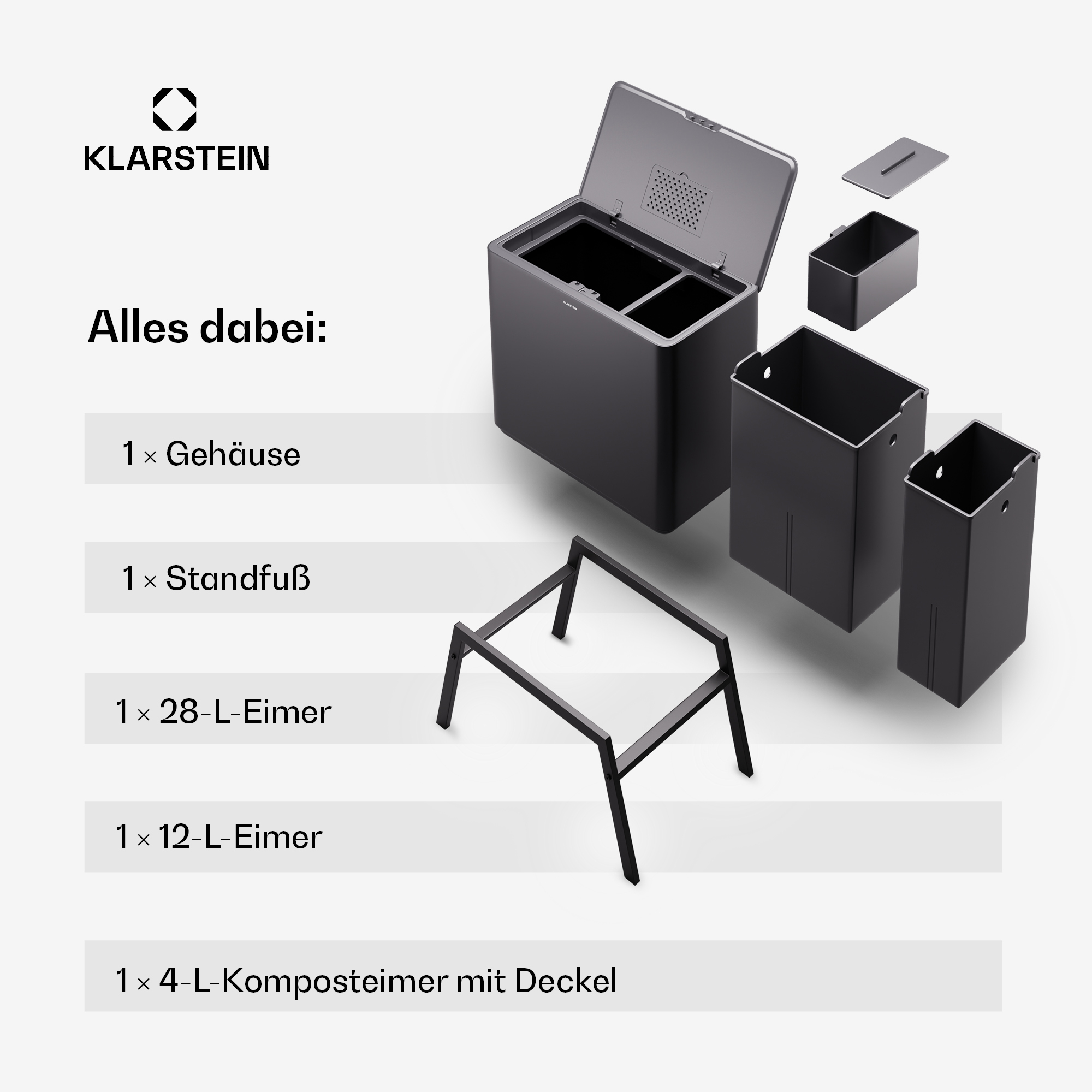 Bidone nero per compost con componenti: bidone, supporto, bidoni da 28 L, 12 L e 4 L. Gli articoli sono disposti.