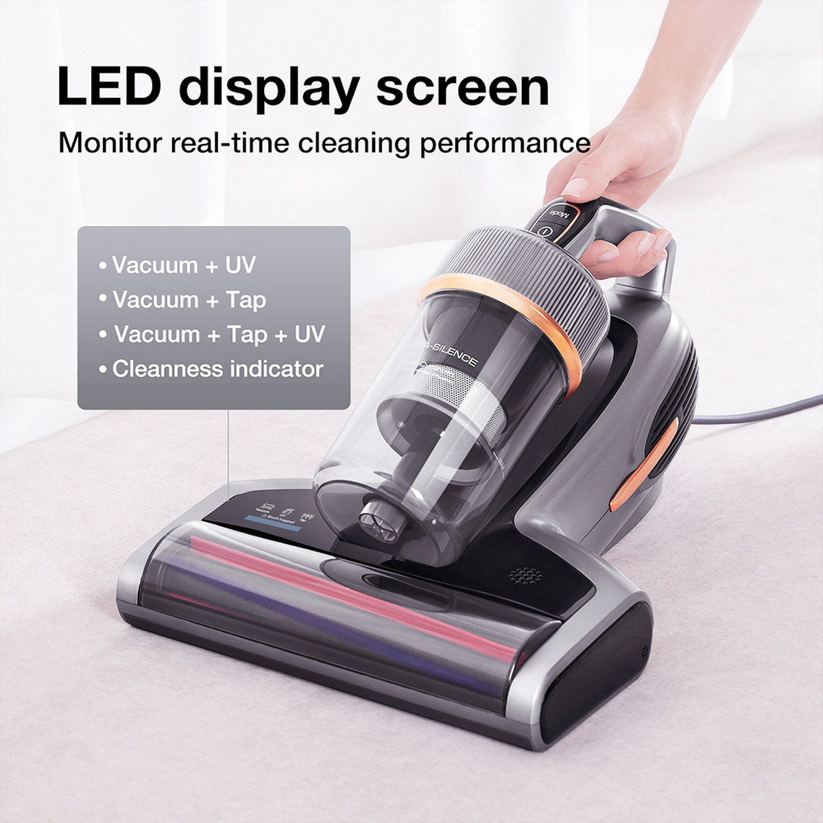 Ein Handstaubsauger mit LED-Anzeige. Zu den Funktionen gehören Vakuum, UV, Tippen und eine Reinheitsanzeige.