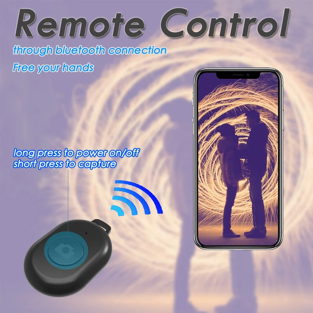 A remote control for a phone, with a phone showing a couple silhouetted by light.