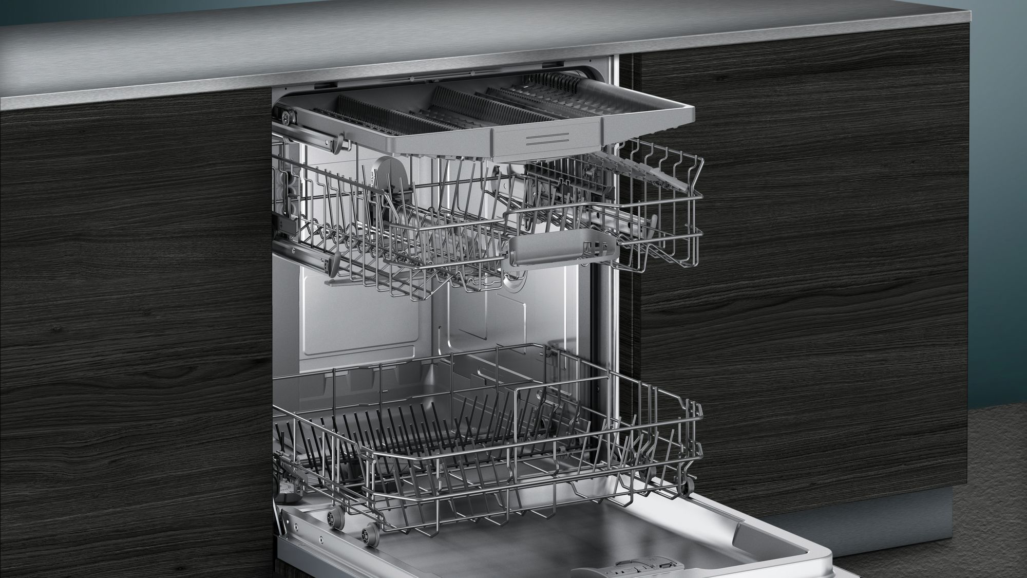 Dishwasher interior with racks, showing the arrangement and design.