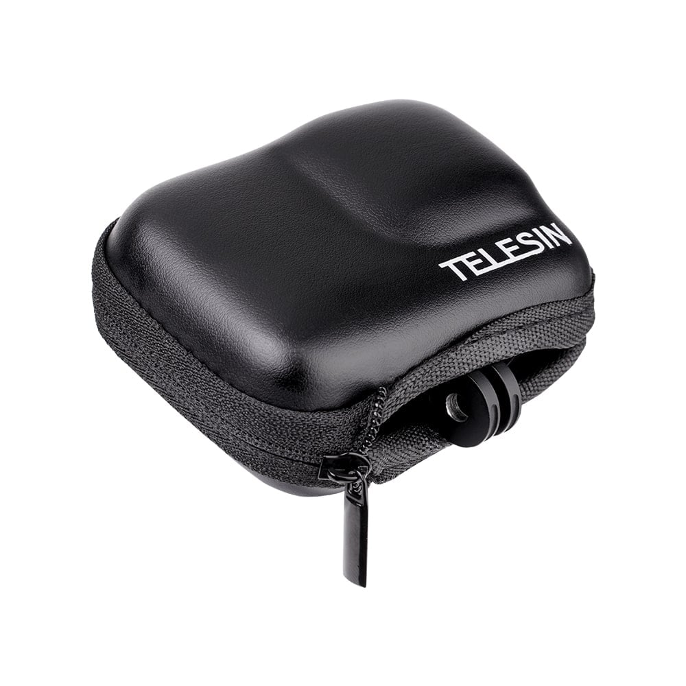 Een zwarte camerahoes met een rits.