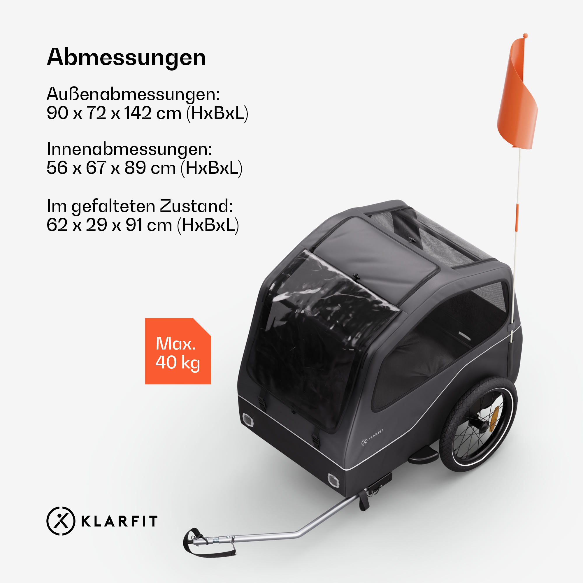 Ein schwarzer und grauer Anhänger mit einer Fahne. Text weist auf Abmessungen und eine Gewichtsbegrenzung von 40 kg hin. Die Marke ist 'KLARFIT'.