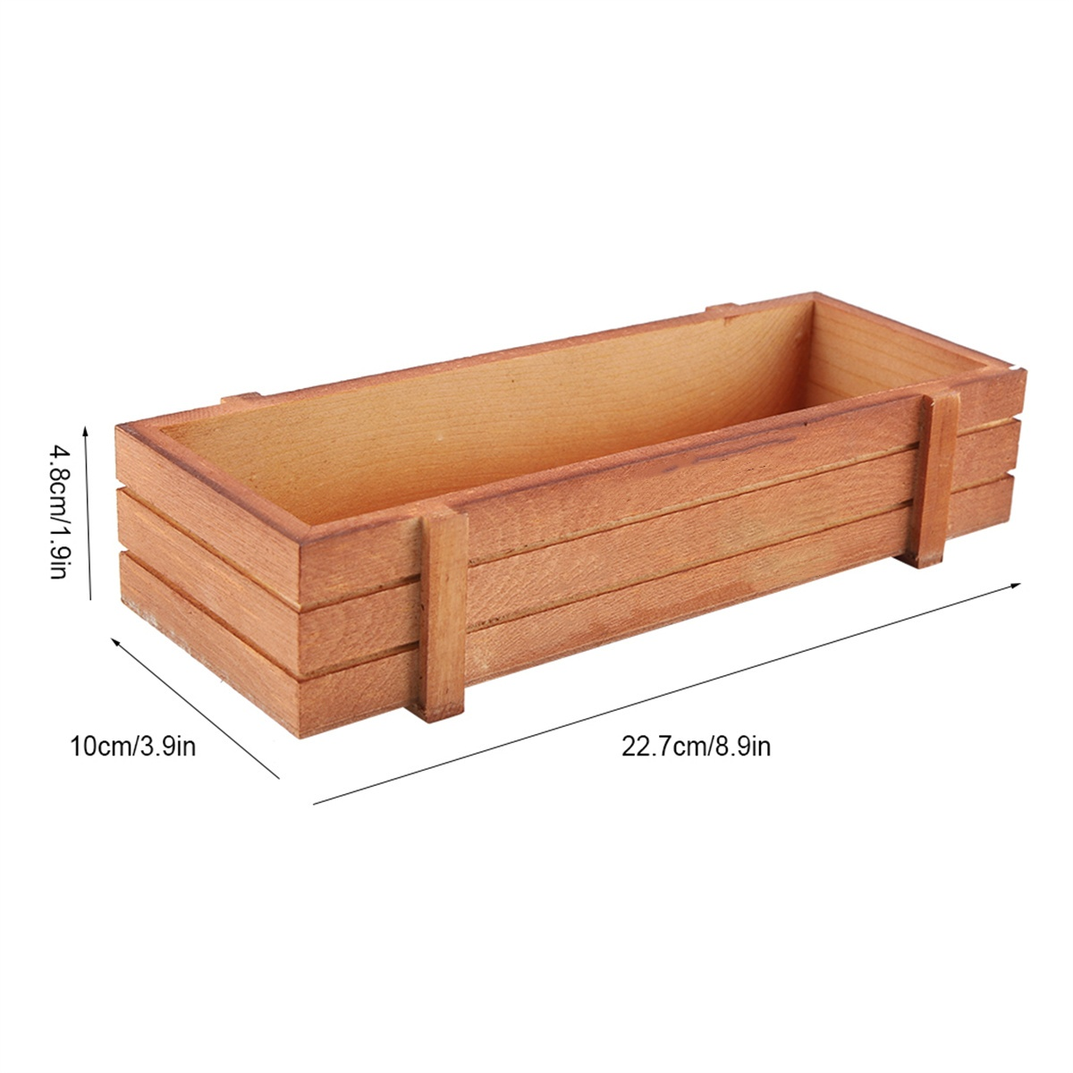 Eine rechteckige Pflanzkiste aus Holz, mit Abmessungen in cm und Zoll beschriftet.