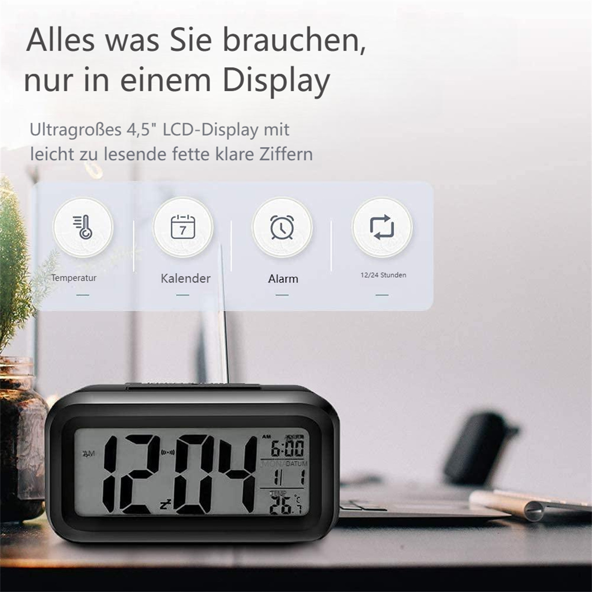 Eine schwarze Digitaluhr mit großem Display. Informationen zu Zeit, Datum und Temperatur werden angezeigt.
