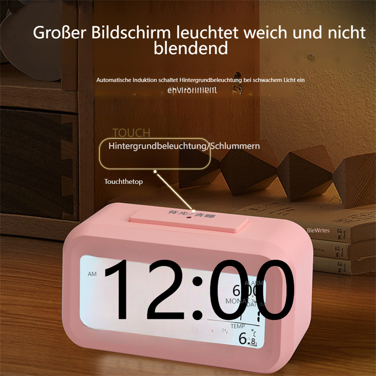 Rosa Digitaluhr mit großem Display, das 12:00 Uhr anzeigt, umgeben von Text.