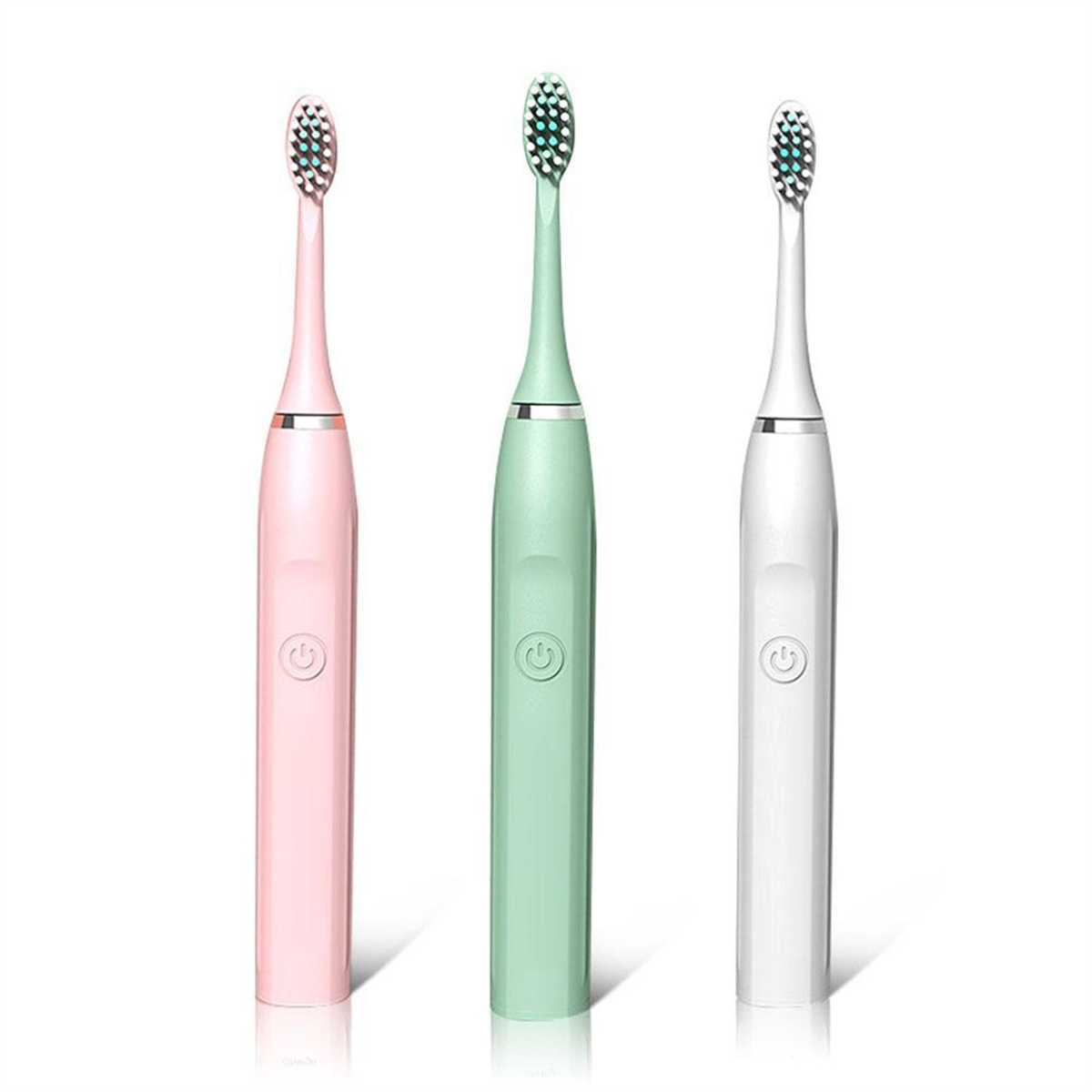 Drei elektrische Zahnbürsten: rosa, grün und weiß, jede mit einer Ein-/Aus-Taste.
