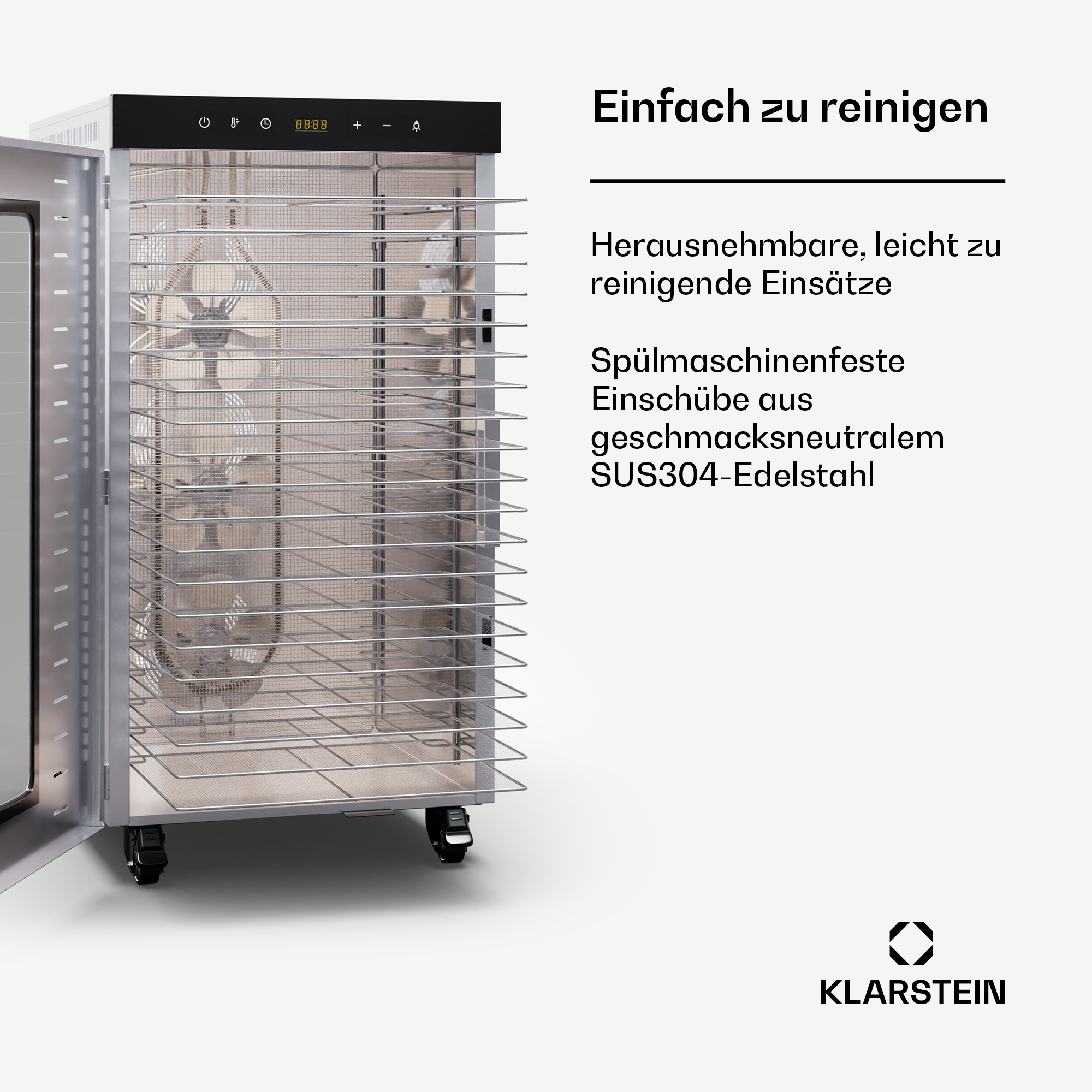 Ein offener Edelstahl-Lebensmittel-Trockner mit Anweisungen auf der rechten Seite des Bildes.