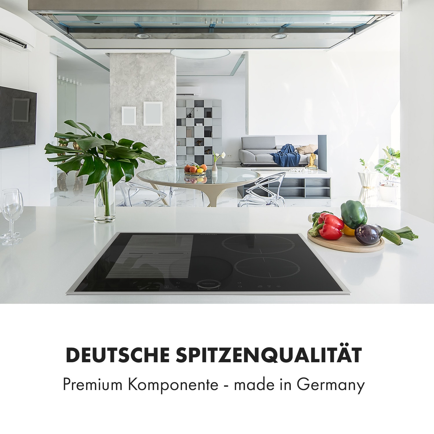 Eine Küche mit einem Kochfeld in der Mitte. Frisches Gemüse rechts, und der Text: Deutsche Spitzenqualität.