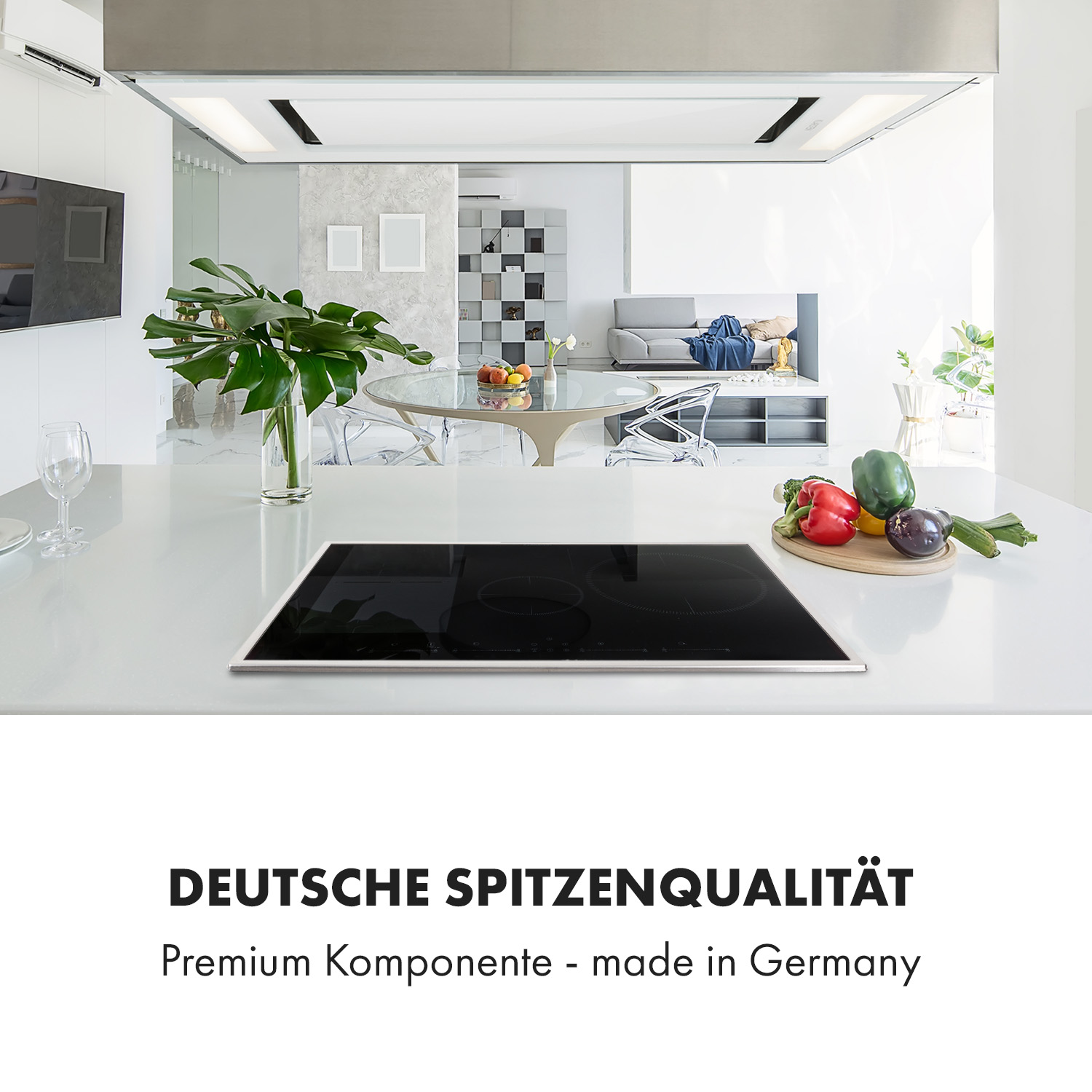 Eine Küche mit einem modernen schwarzen Kochfeld auf einer weißen Arbeitsplatte, mit Text über deutsche Qualität.