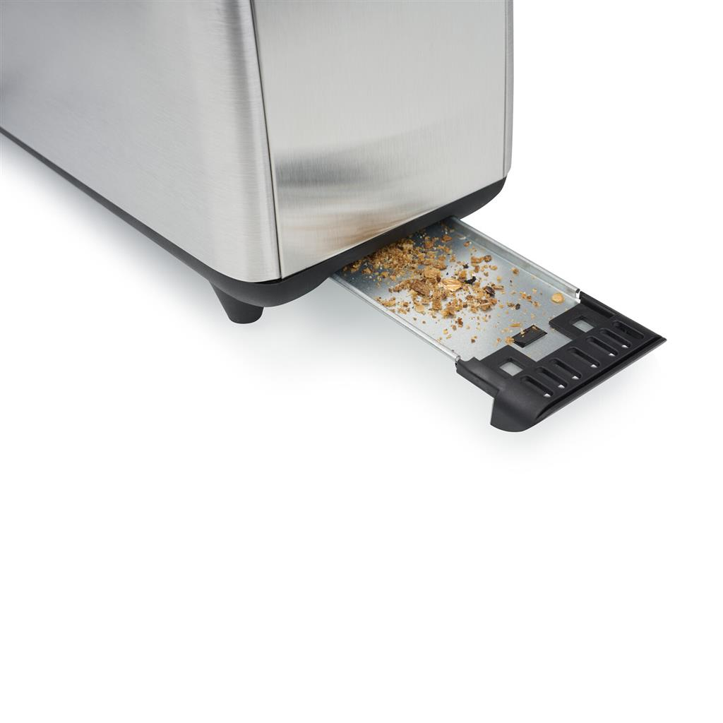 Toster z wysuniętą szufladą na okruchy, pokazujący okruchy.