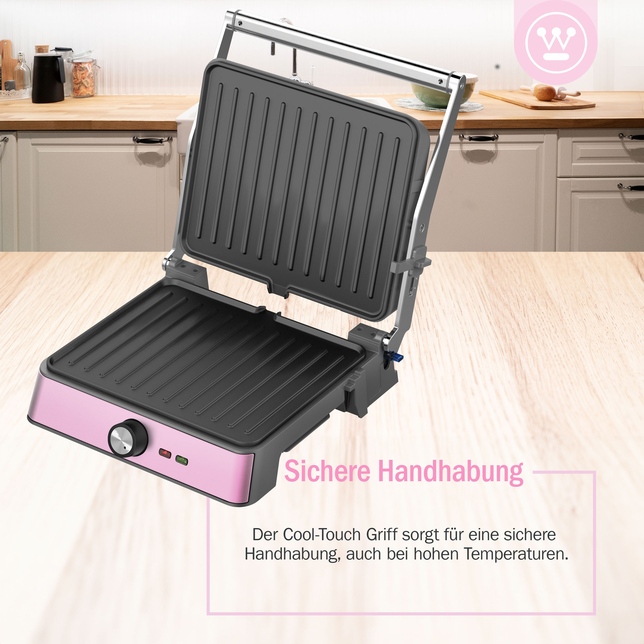 Ein offener rosa-schwarzer Tischgrill mit Bedienknopf und Text.