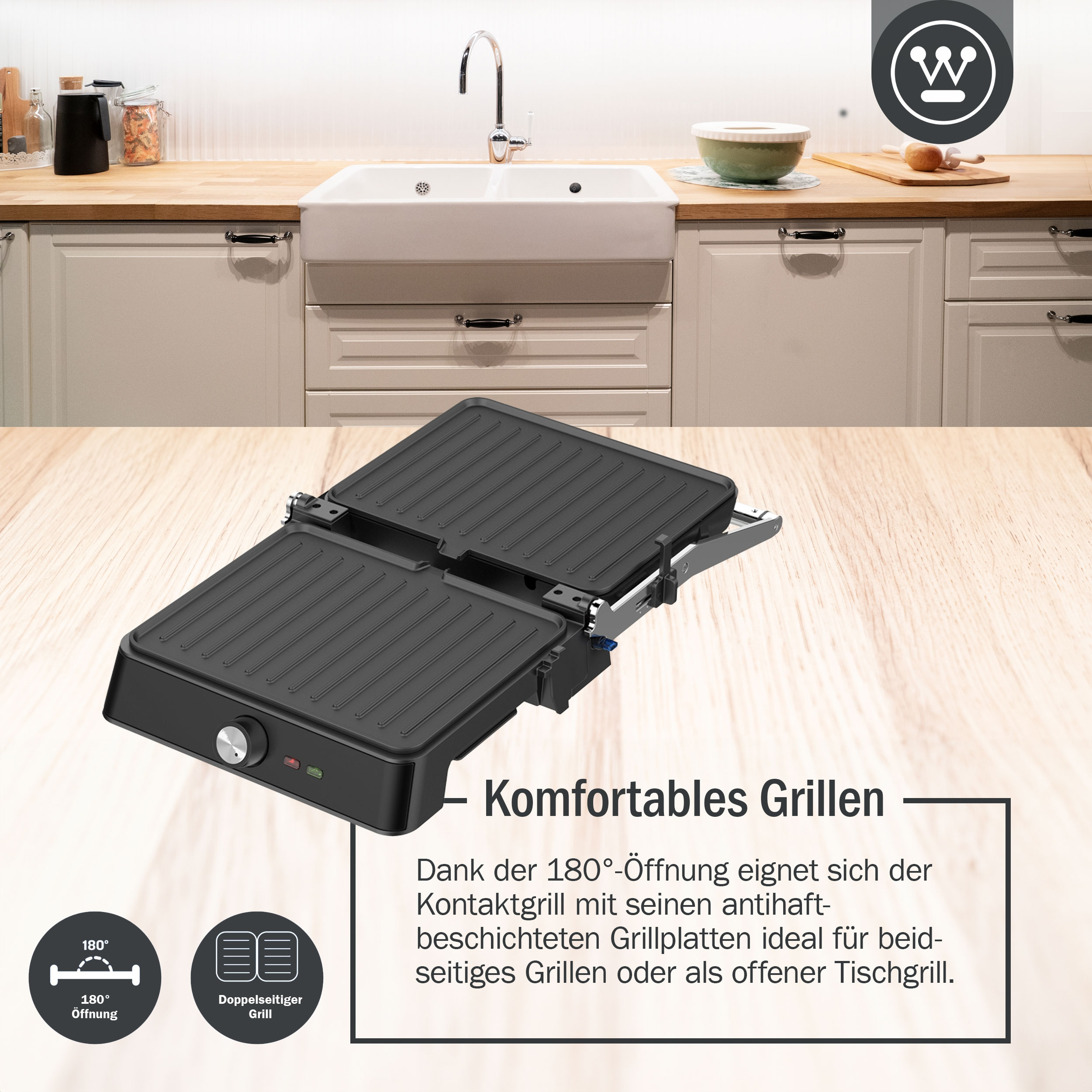Schwarzer Grill offen, mit Text. Küchenhintergrund.