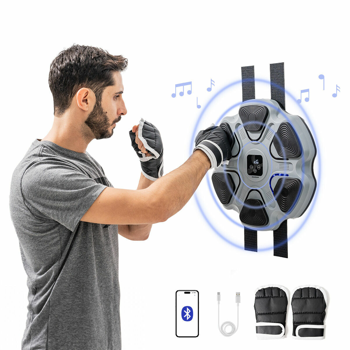 Ein Mann boxt mit Handschuhen gegen einen Wand-Box-Trainer.