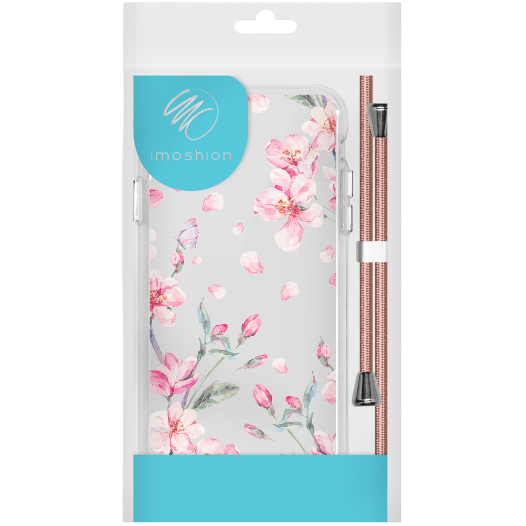 Coque transparente avec motif floral rose, cordon or rose et emballage blanc.