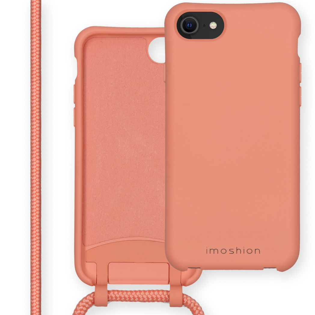 Koraalroze telefoonhoesje met een koord en een telefoon. De merknaam is imoshion.
