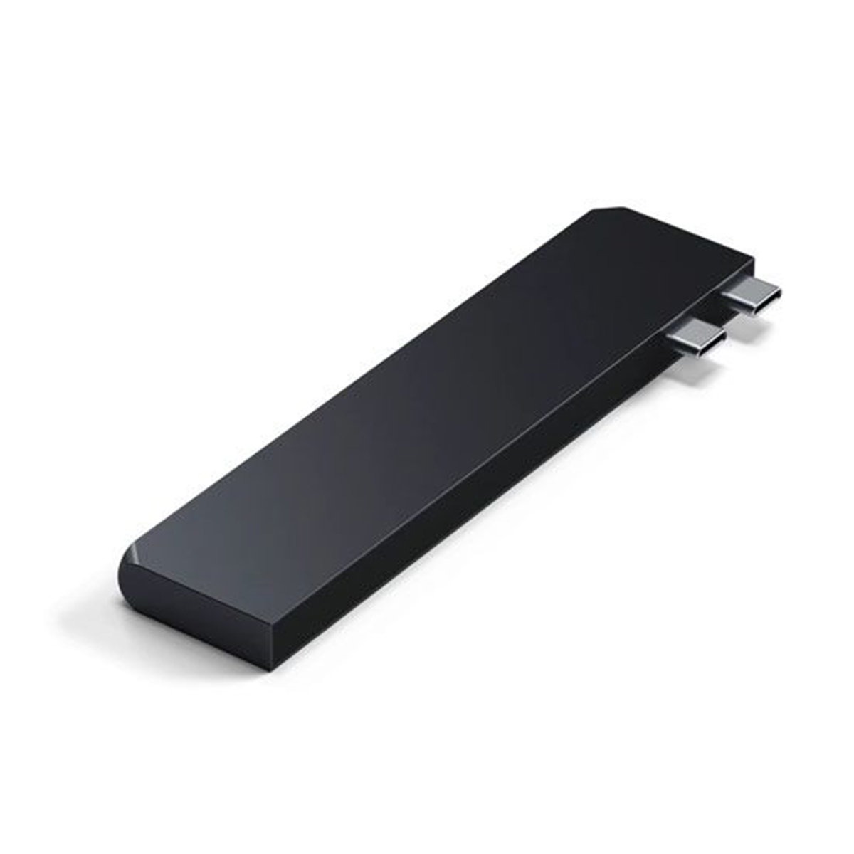 Hub USB-C negro con dos puertos en superficie blanca, diseño minimalista, vista en ángulo.