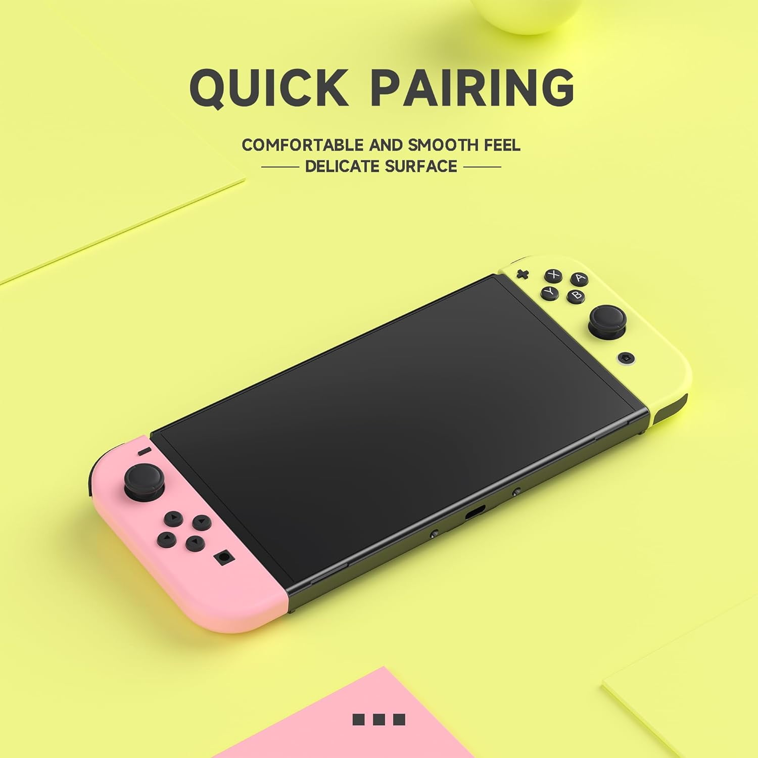 Eine Nintendo Switch mit pinken und gelben Controllern auf gelbem Hintergrund.