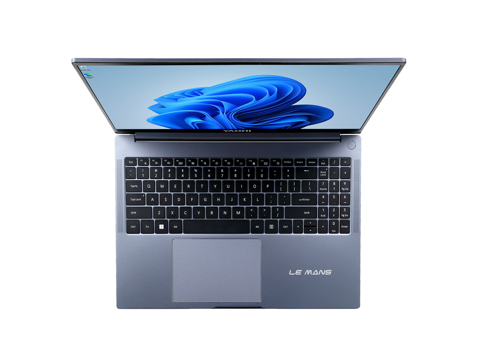 Vista dall'alto del laptop, aperto. Lo schermo mostra un'immagine blu. La tastiera è visibile.