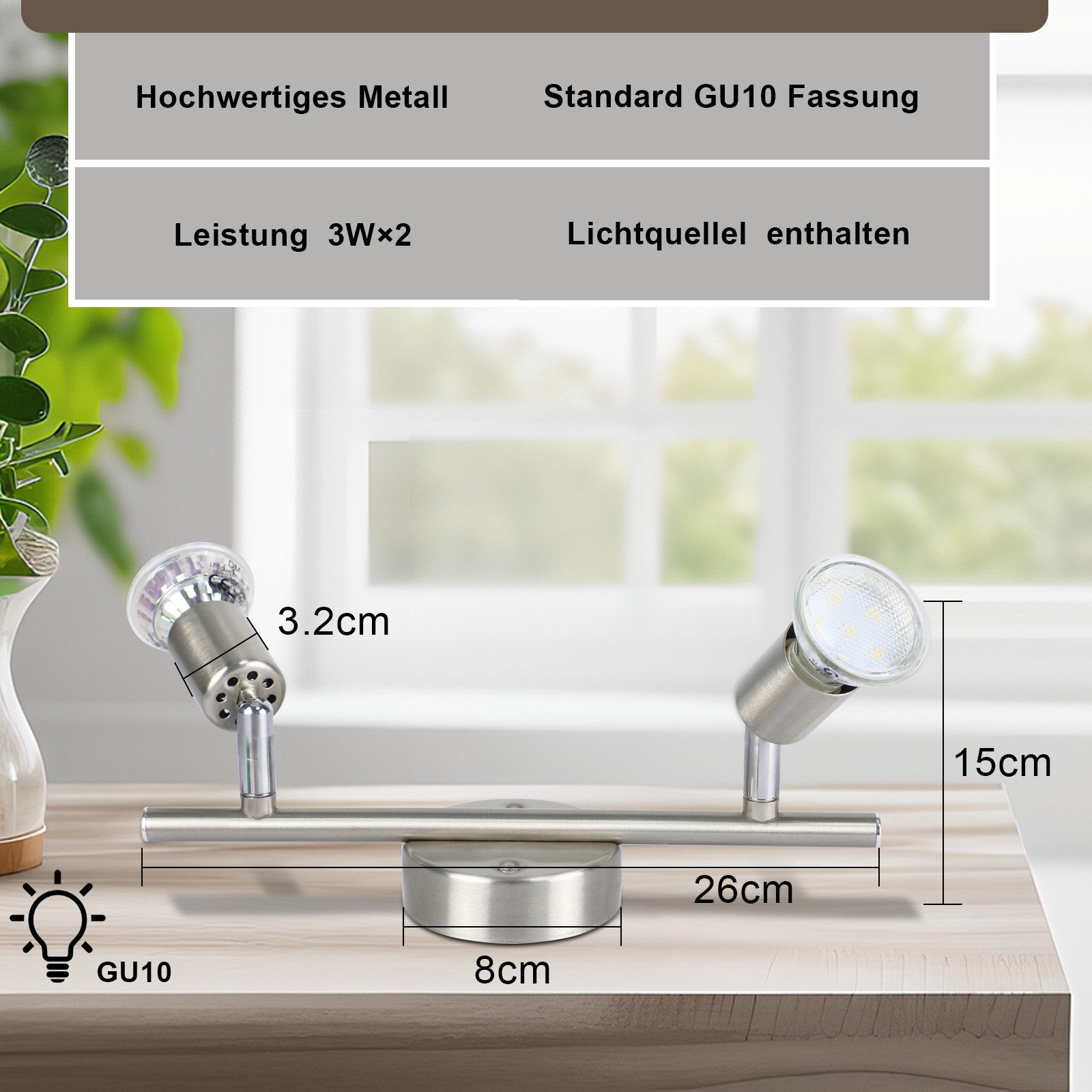 Srebrne oświetlenie szynowe z dwoma światłami i podstawą, wymiary na jasnym drewnianym stole.