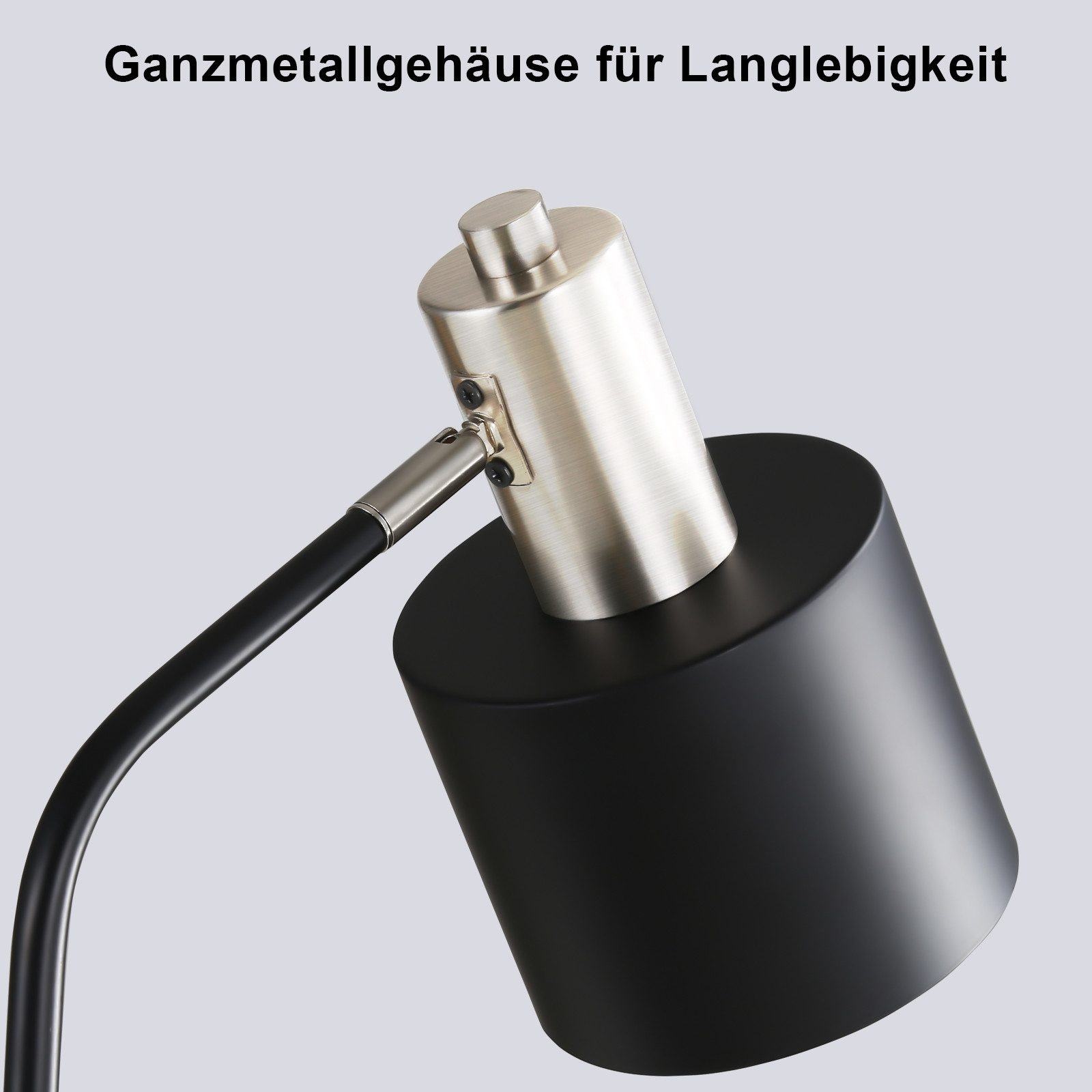 Zbliżenie czarnej i srebrnej głowicy lampy. Tekst 'Ganzmetallgehäuse für Langlebigkeit' znajduje się powyżej.