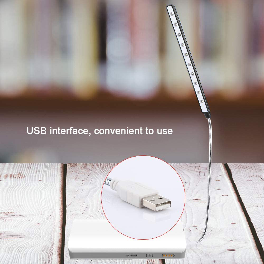 Eine USB-betriebene flexible LED-Leuchte neben einem USB-Kabel und einem weißen Gerät.