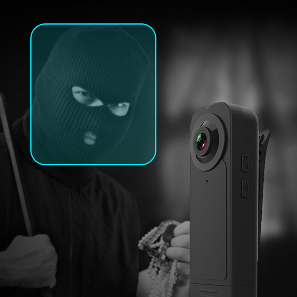 Ein Dieb mit Maske in einem blauen Feld. Eine Kamera ist auf ihn gerichtet und nimmt eine Halskette auf.