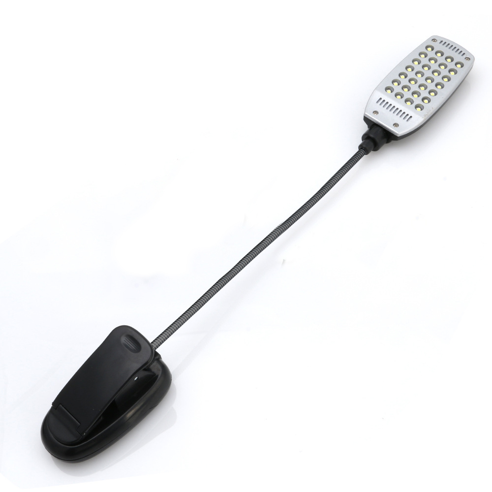 Eine flexible Nackenleuchte mit Clip. Das Licht ist silber und schwarz.