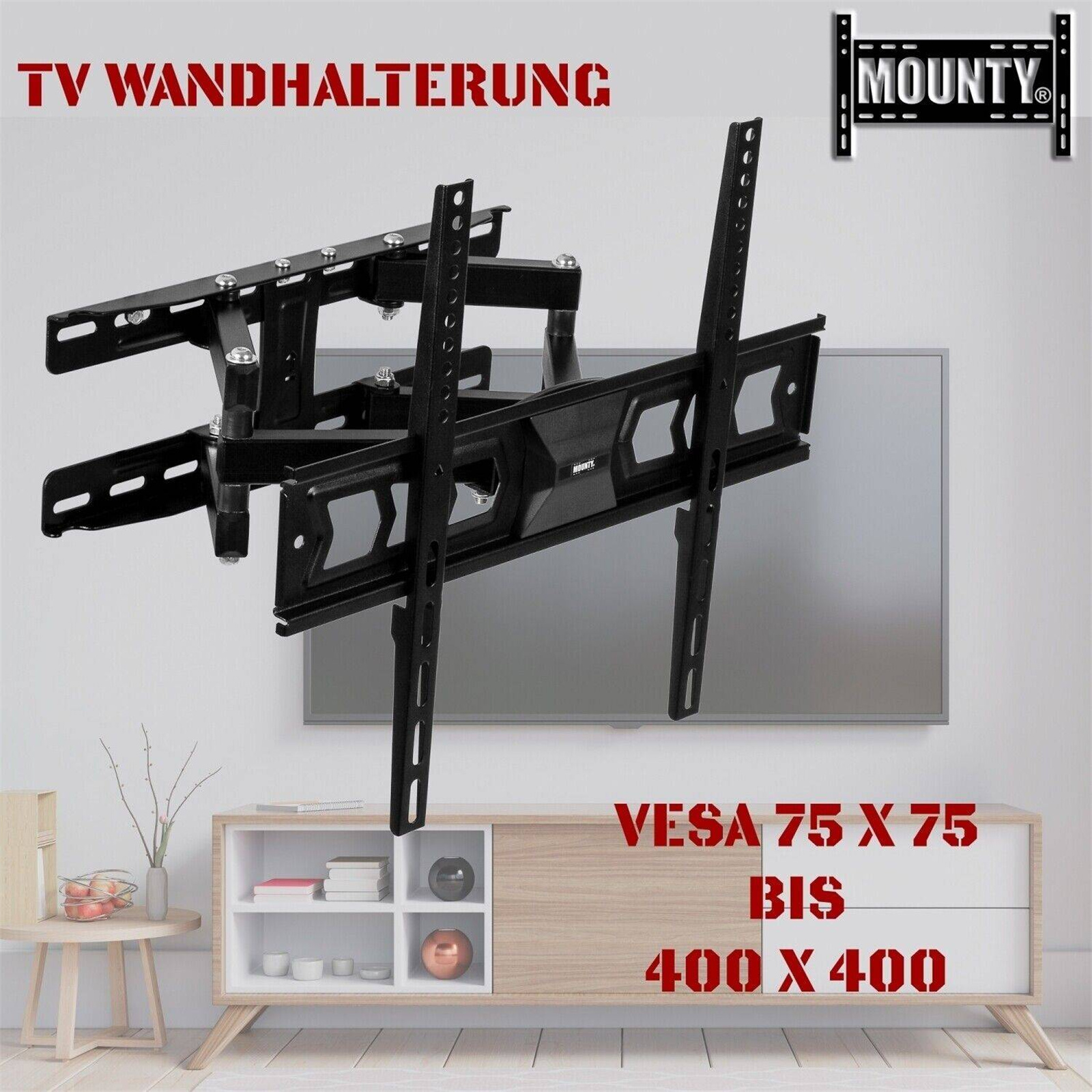 TV-Wandhalterung an einer Wand. Die Halterung ist schwarz. Ein Fernseher ist daran befestigt. Ein Schrank ist unter dem Fernseher.