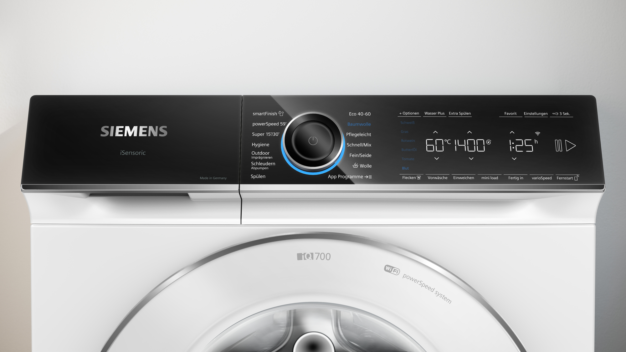 Nahaufnahme des Bedienfelds einer Siemens Waschmaschine mit Knöpfen und Display.