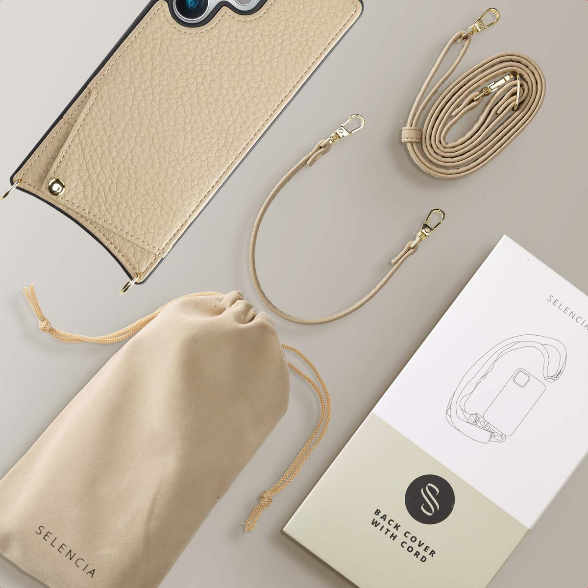 Set custodia per telefono con accessori: cinturino, custodia e scatola. Beige.