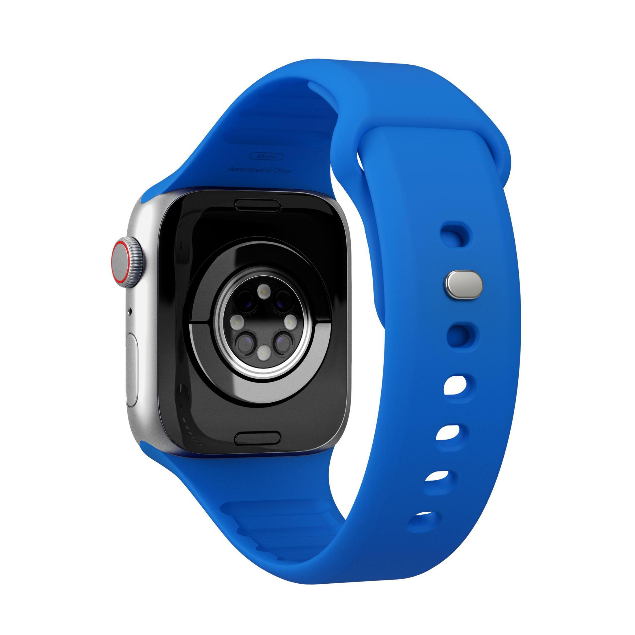 Apple Watch z niebieskim paskiem. Tył pokazuje czujniki i szczegóły.