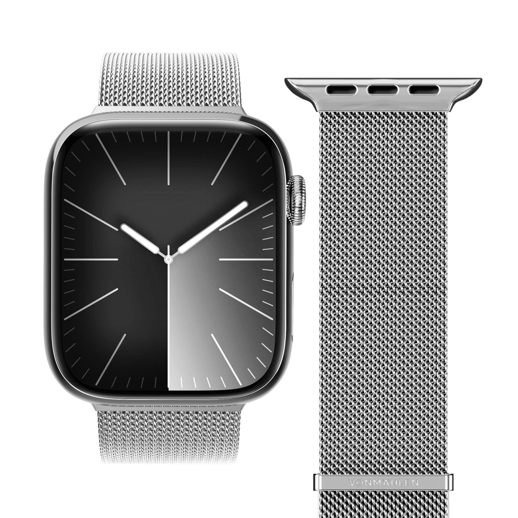 Apple Watch con cinturino in maglia d'argento e cinturino aggiuntivo. Display in bianco e nero.